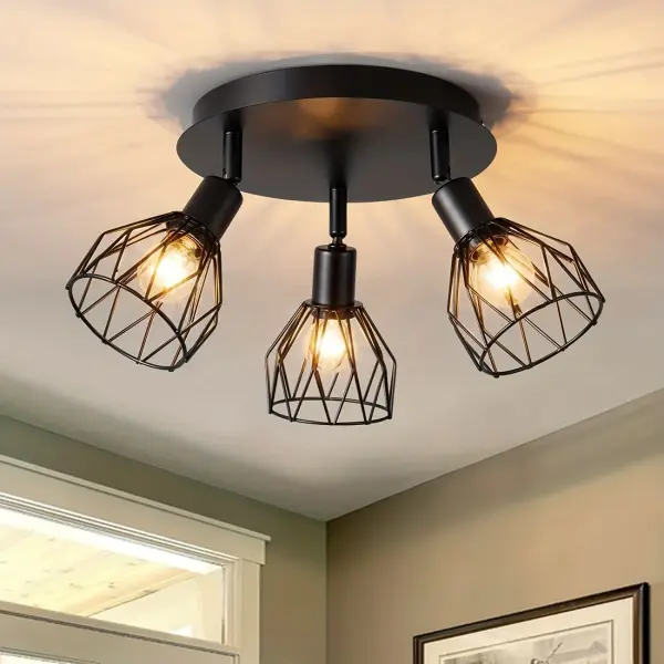 Kitchen lighting fixtures are ceiling mounted, with a three way rotating black iron lampshade